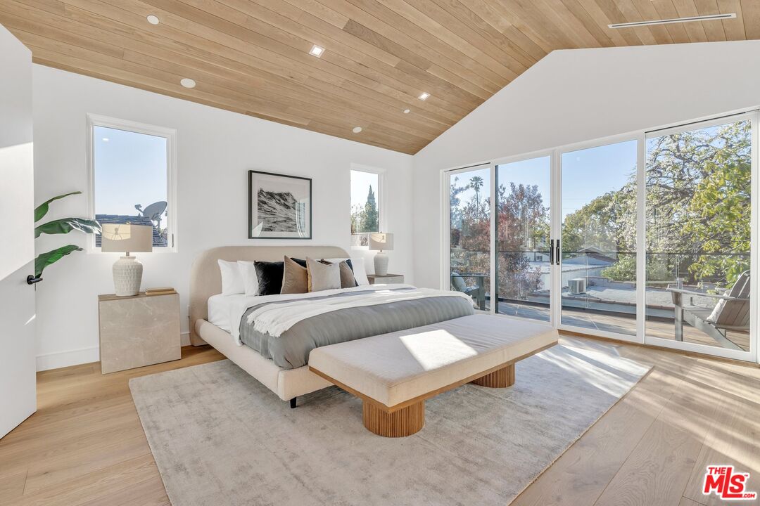 1071 Marco Place Venice, CA 90291 - Photo 22 of 39 a bed room with a bed and a large window