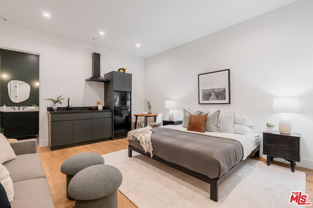 1071 Marco Place Venice, CA 90291 - Photo 28 of 39 a bedroom with bed and a couch