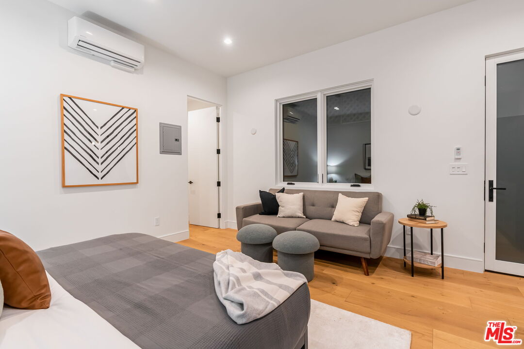 1071 Marco Place Venice, CA 90291 - Photo 30 of 39 a living room with furniture and a window