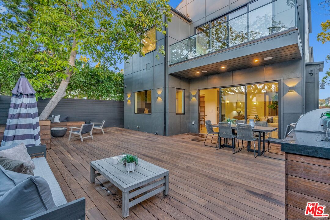 1071 Marco Place Venice, CA 90291 - Photo 32 of 39 a view of a dinning table and chairs in the patio of the house
