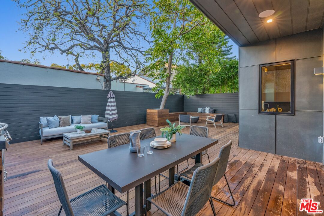 1071 Marco Place Venice, CA 90291 - Photo 33 of 39 a outdoor dining space with furniture and wooden floor