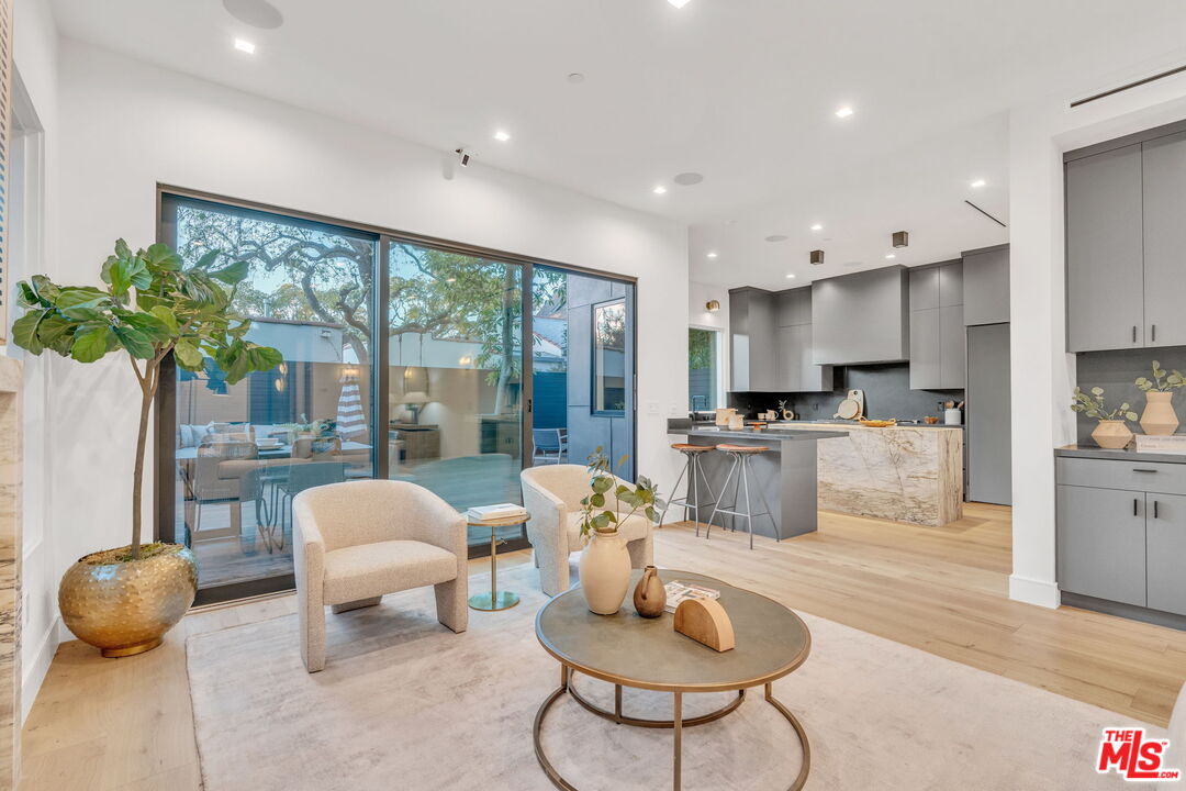 1071 Marco Place Venice, CA 90291 - Photo 8 of 39 a living room with furniture and a large window