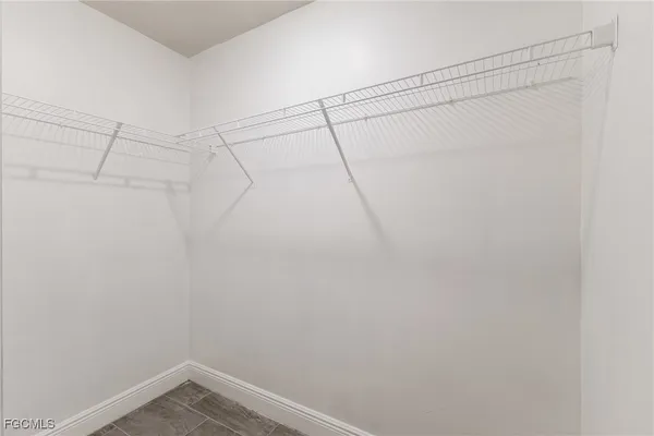 a view of a room with racks on the wall