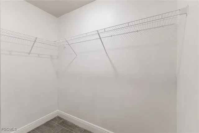 a view of a room with racks on the wall