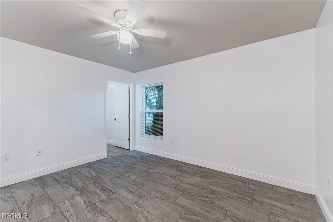2405 Maple Avenue Fort Myers, FL 33901 - Photo 13 of 27 a view of an empty room with a window
