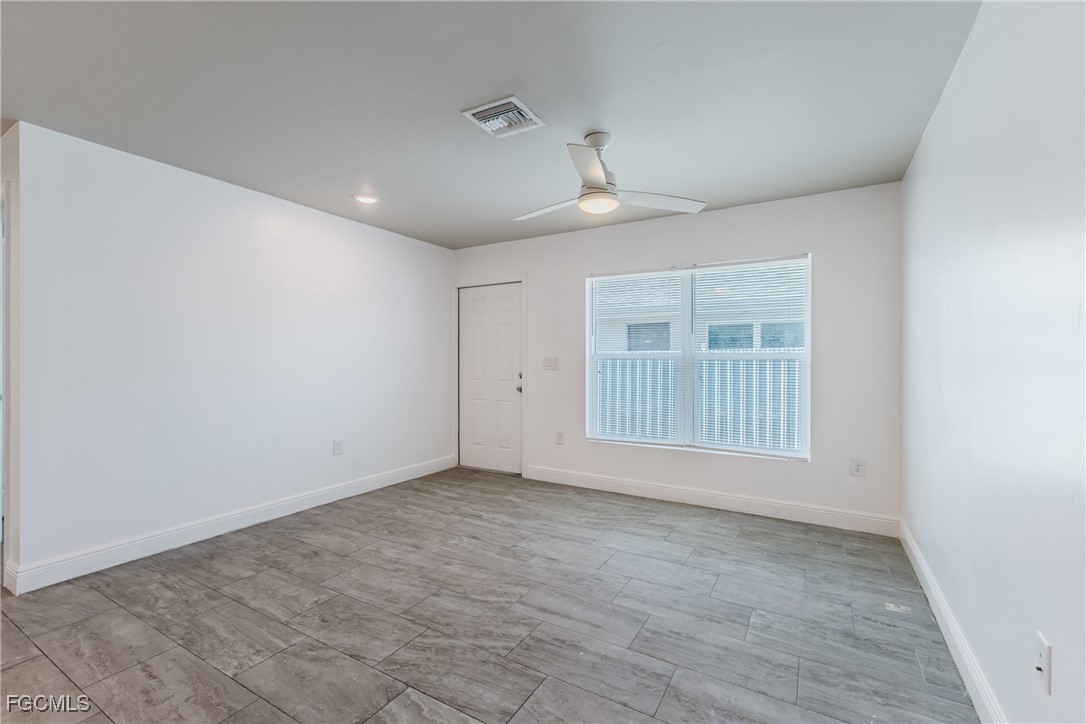 2405 Maple Avenue Fort Myers, FL 33901 - Photo 24 of 27 a view of an empty room with a window