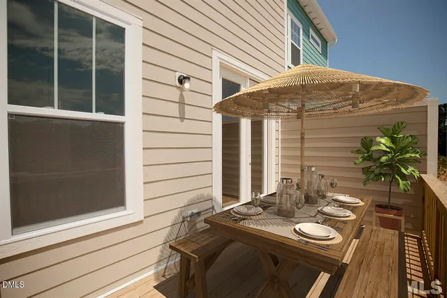 a balcony view with a potted plant