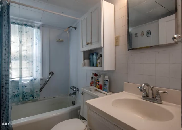 a bathroom with a sink and a bathtub