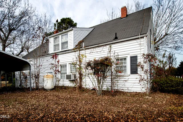 a front view of a house with garage