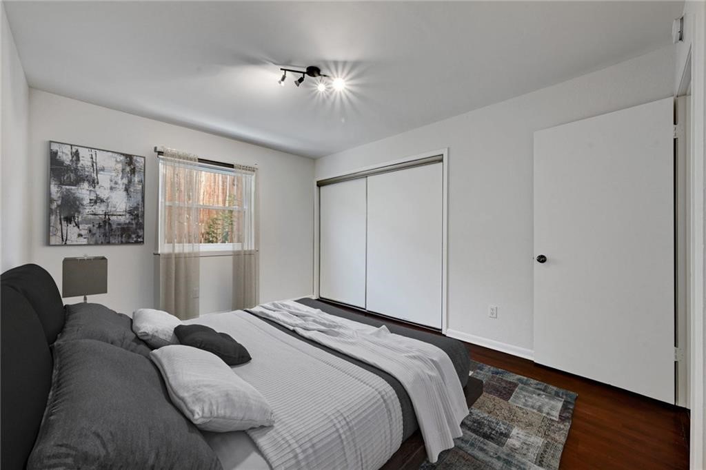 2104 Cullen Avenue, Unit 4117 Austin, TX 78757 - Photo 28 of 36 a bedroom with a large bed and a window