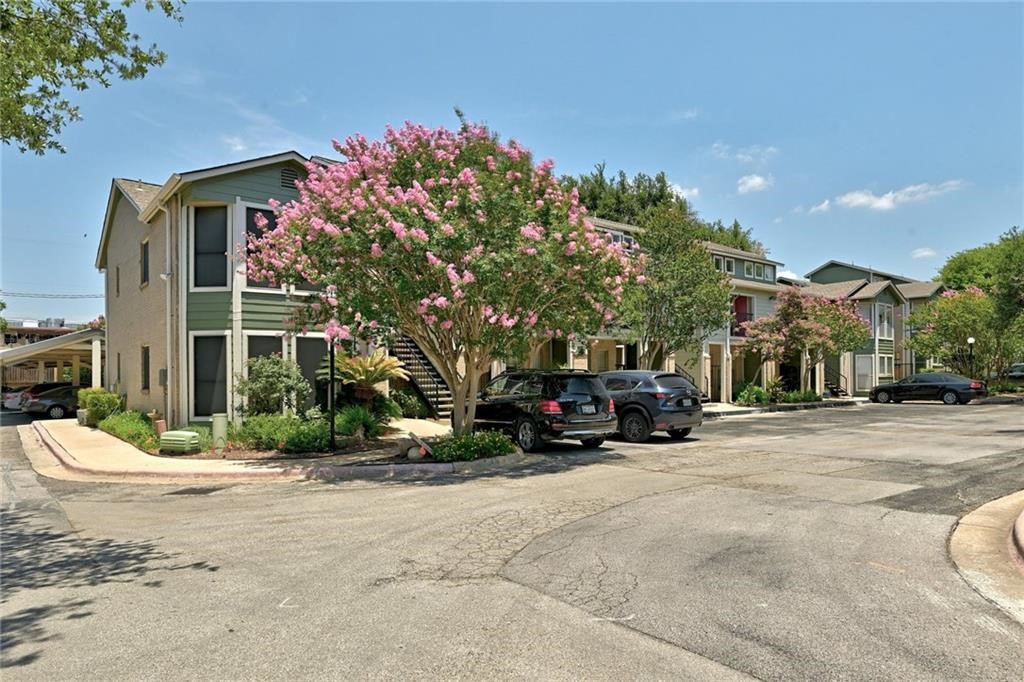 2104 Cullen Avenue, Unit 4117 Austin, TX 78757 - Photo 35 of 36 a view of a house with a cars park