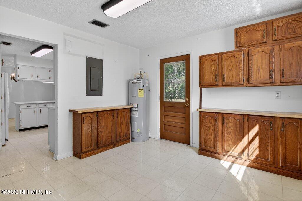5785 George Hodges Road Macclenny, FL 32063 - Photo 28 of 55 a view of a kitchen with furniture and cabinet