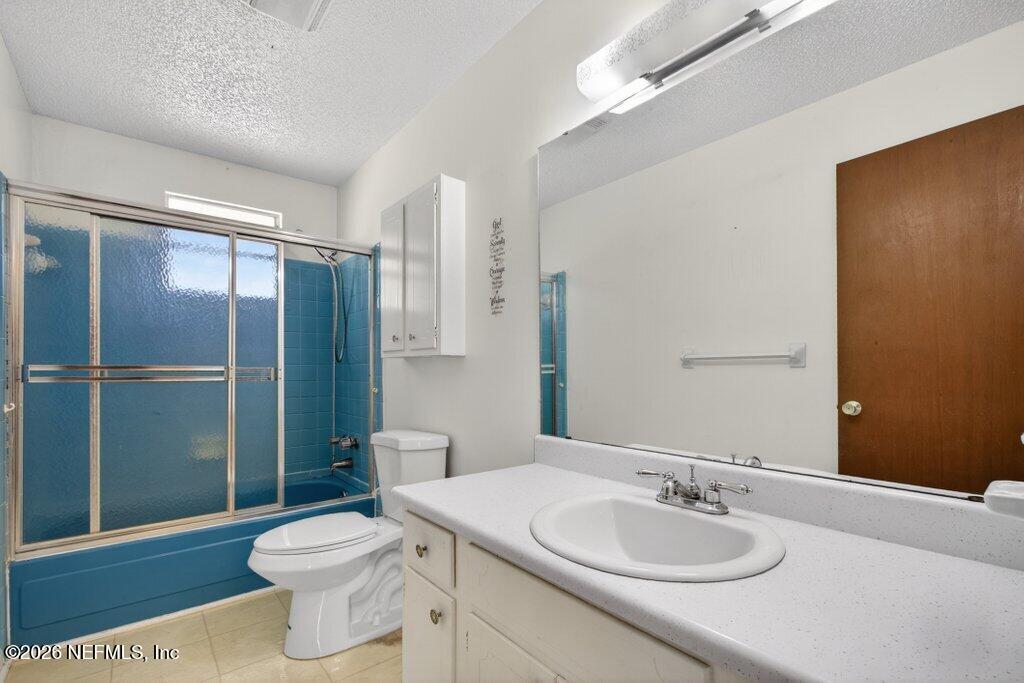5785 George Hodges Road Macclenny, FL 32063 - Photo 33 of 55 a bathroom with a sink a toilet and shower