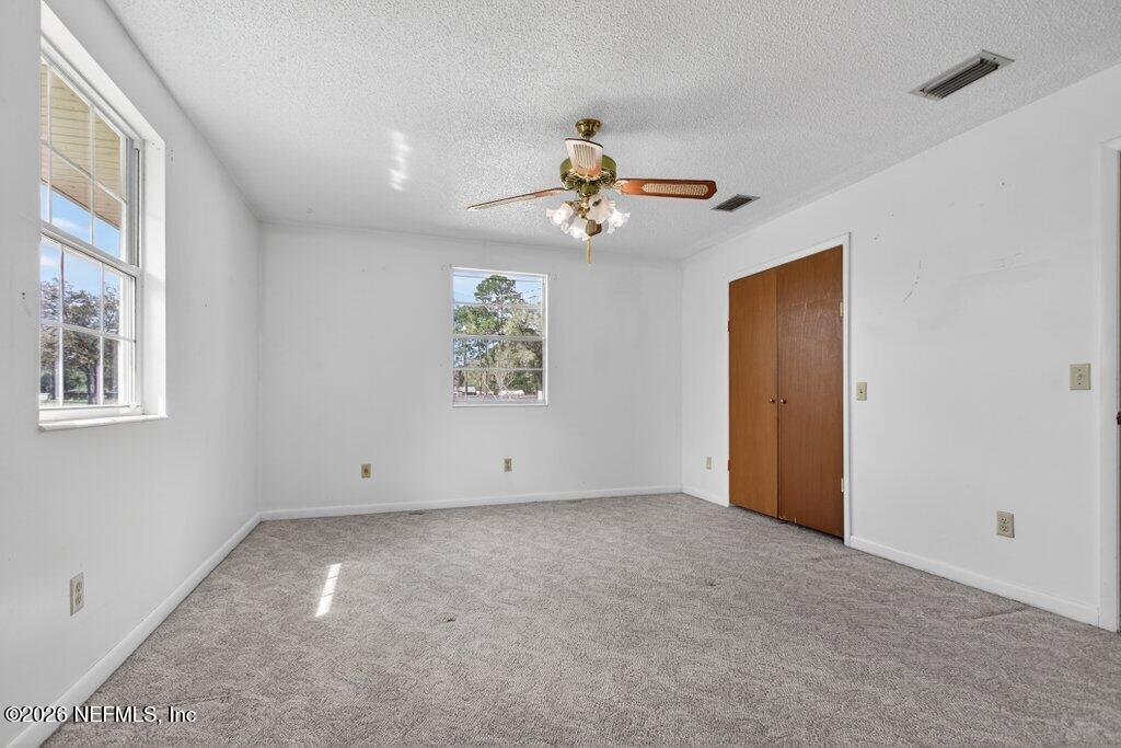 5785 George Hodges Road Macclenny, FL 32063 - Photo 39 of 55 a view of an empty room with a window