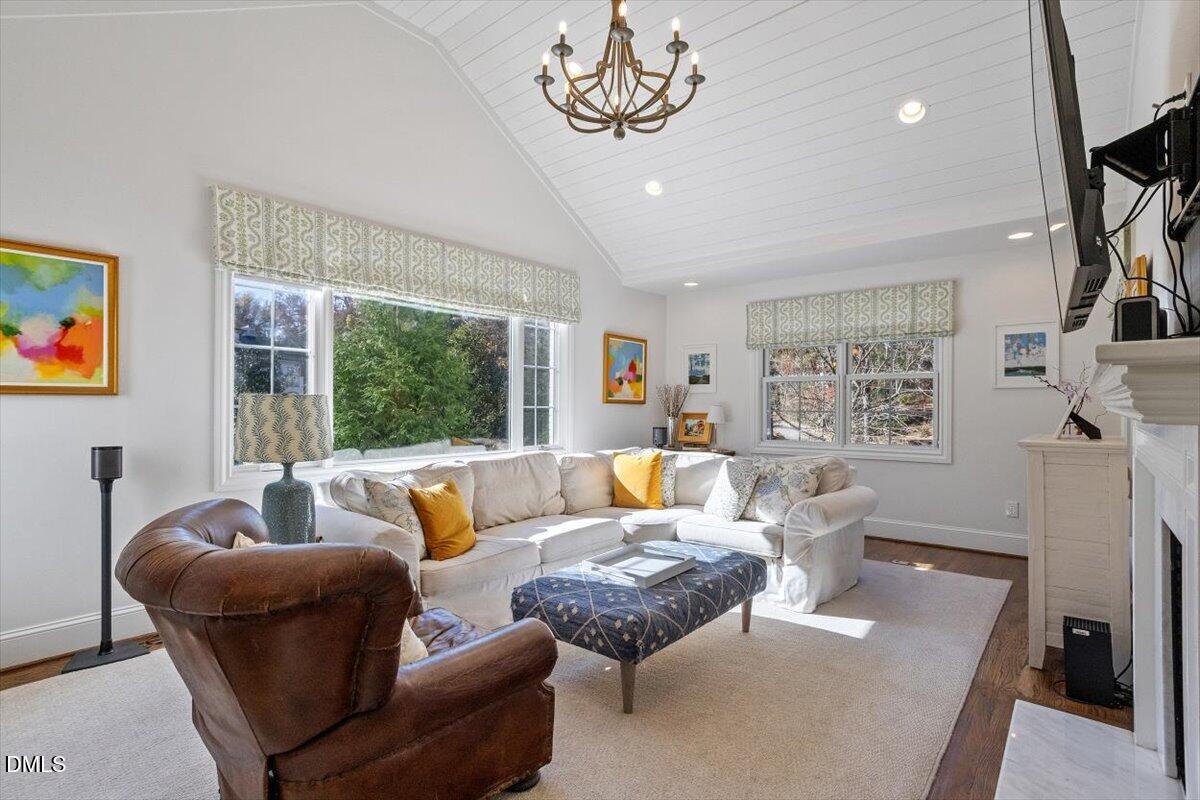 2416 East Lake Drive Raleigh, NC 27609 - Photo 15 of 42 a living room with furniture and a large window