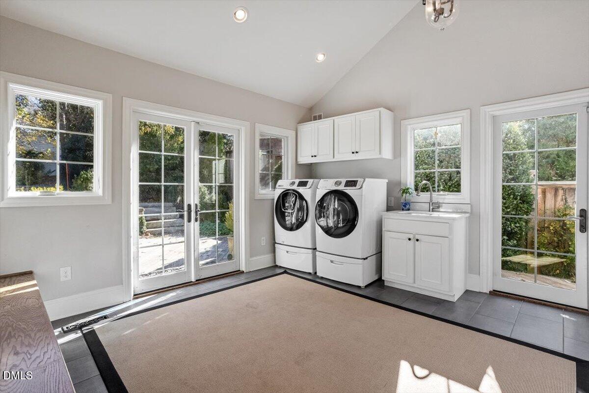 2416 East Lake Drive Raleigh, NC 27609 - Photo 17 of 42 a utility room with dryer and washer