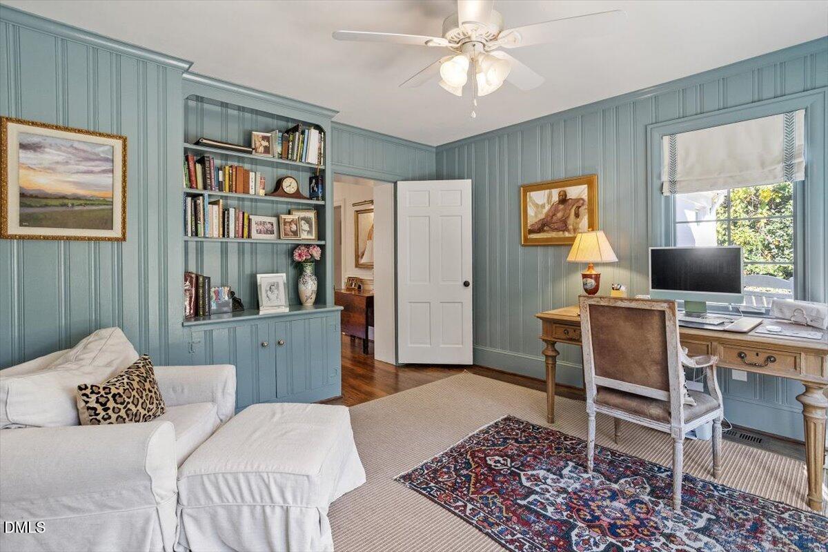 2416 East Lake Drive Raleigh, NC 27609 - Photo 20 of 42 a living room with furniture and a window