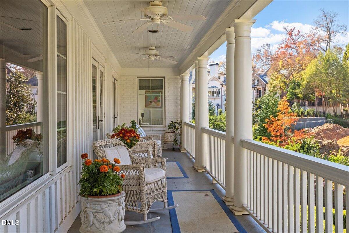 2416 East Lake Drive Raleigh, NC 27609 - Photo 4 of 42 a view of a porch with furniture