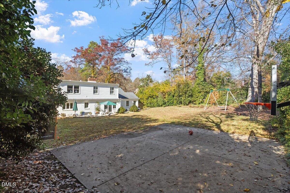 2416 East Lake Drive Raleigh, NC 27609 - Photo 42 of 42 a view of a house with a yard
