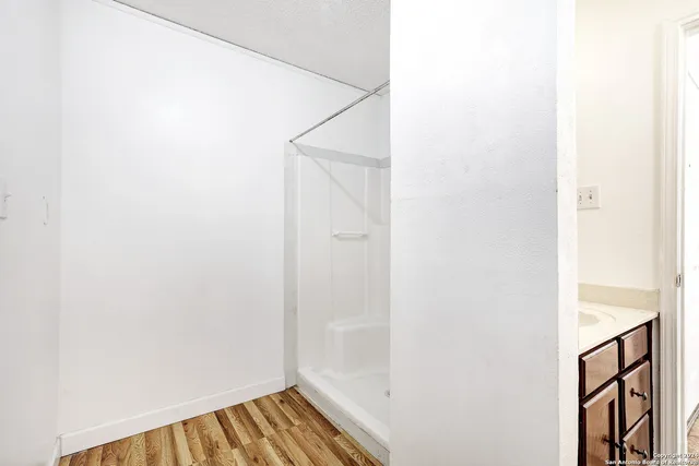 a view of empty room with closet