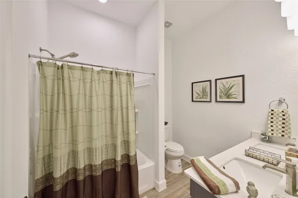 a bathroom with a sink and a shower