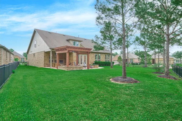 $795,000 | 230 Connemara Drive, The Woodlands, TX 77382