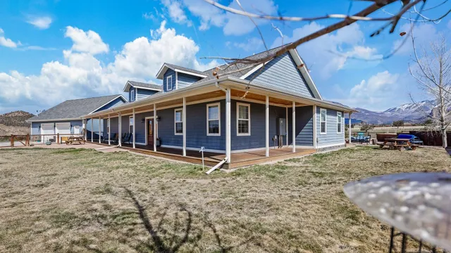 a view of multiple houses with a city view