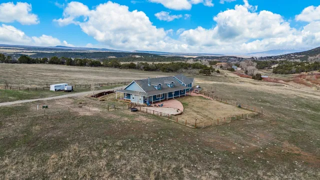 an aerial view of a houses with outdoor space