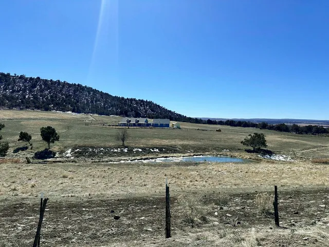 a view of a lake with a mountain in the background