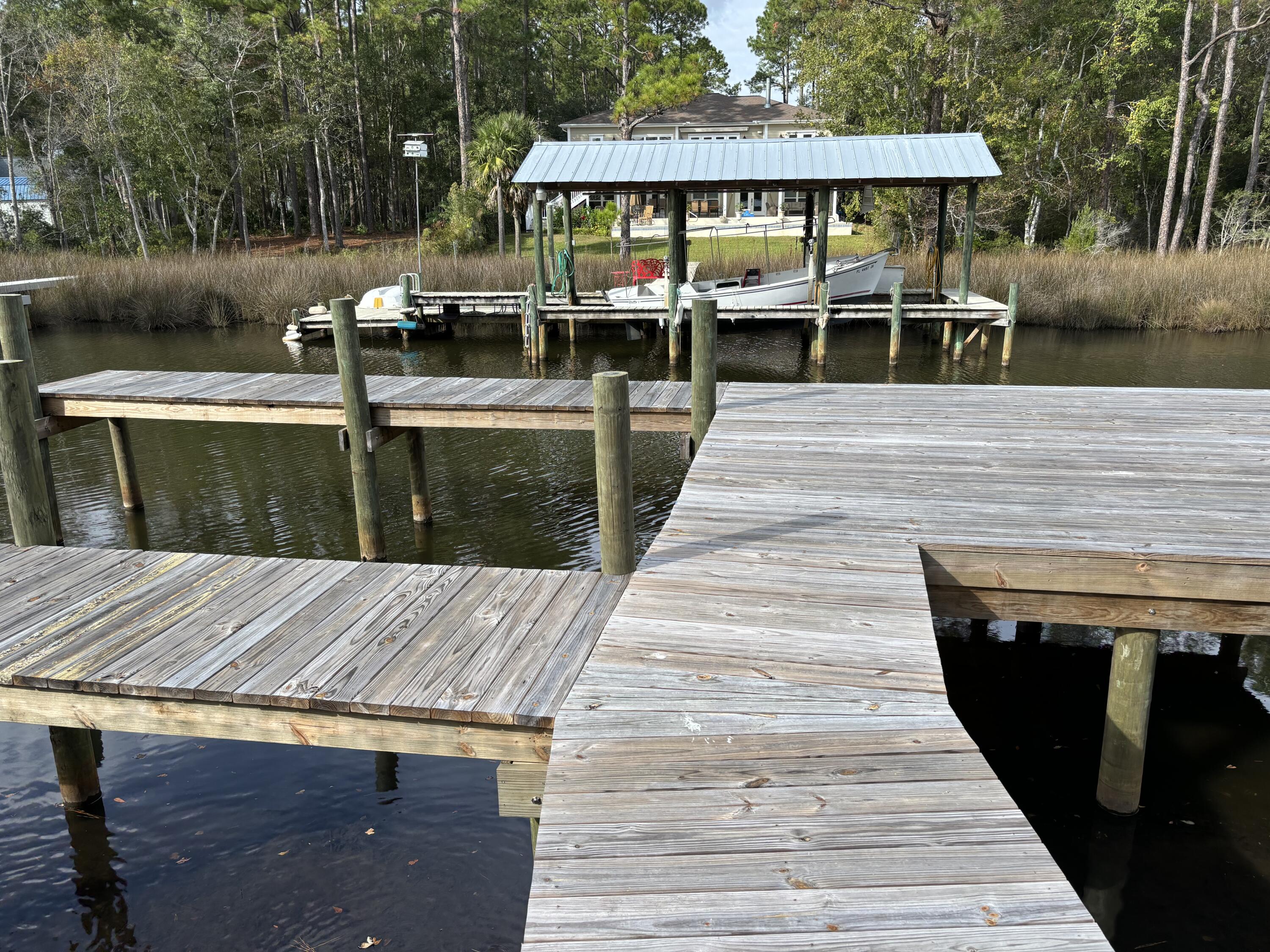 Lot 17 Redfish Point Drive Freeport, FL 32439 - Photo 8 of 9 a view of swimming pool with chairs in patio