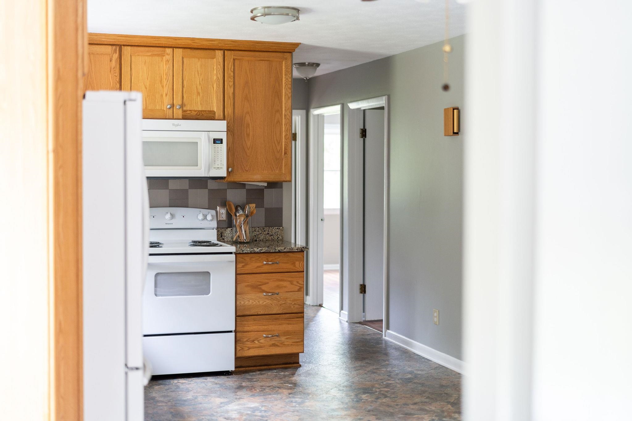 5264 Cold Springs Road Raphine, VA 24472 - Photo 19 of 57 a kitchen with stainless steel appliances a refrigerator and a stove
