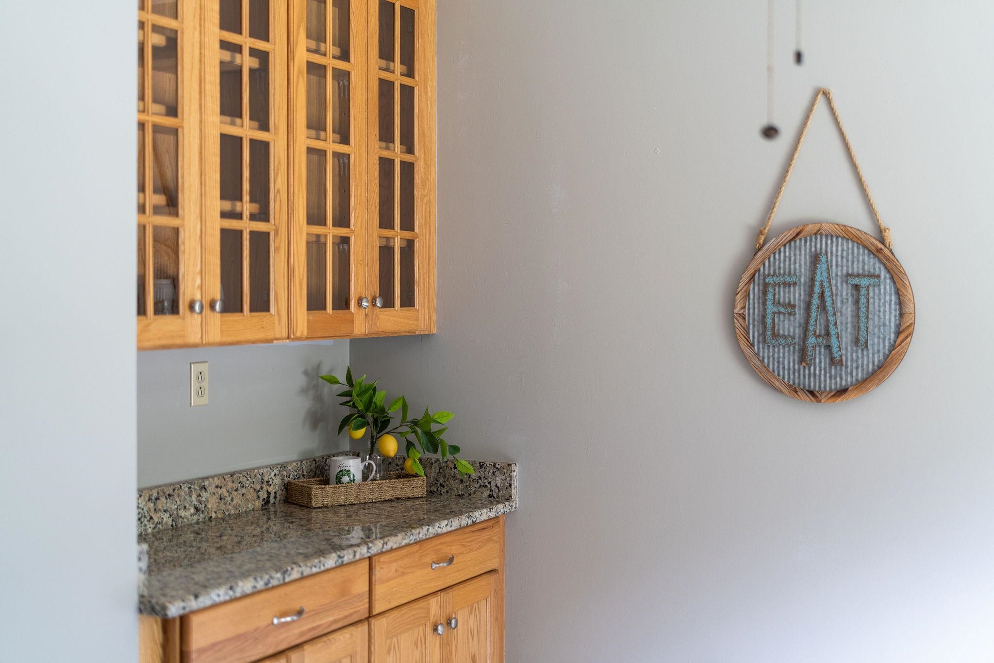 5264 Cold Springs Road Raphine, VA 24472 - Photo 22 of 57 a bathroom with a granite countertop sink and a mirror