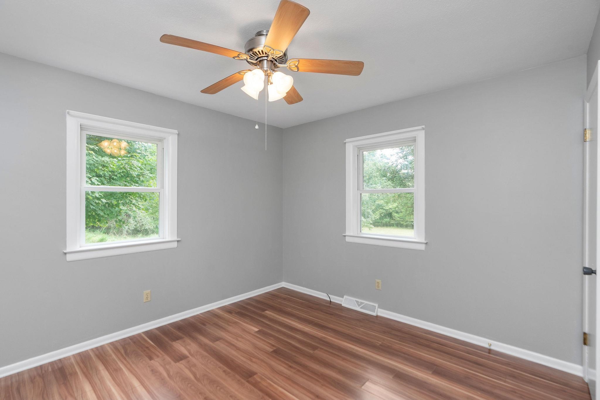 5264 Cold Springs Road Raphine, VA 24472 - Photo 29 of 57 a view of an empty room with wooden floor and a window