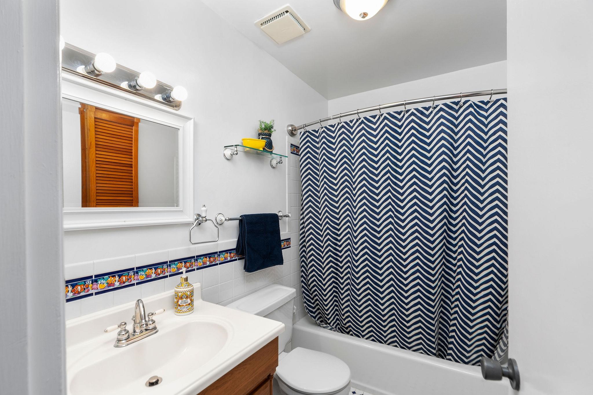 5264 Cold Springs Road Raphine, VA 24472 - Photo 32 of 57 a bathroom with a sink a toilet and mirror