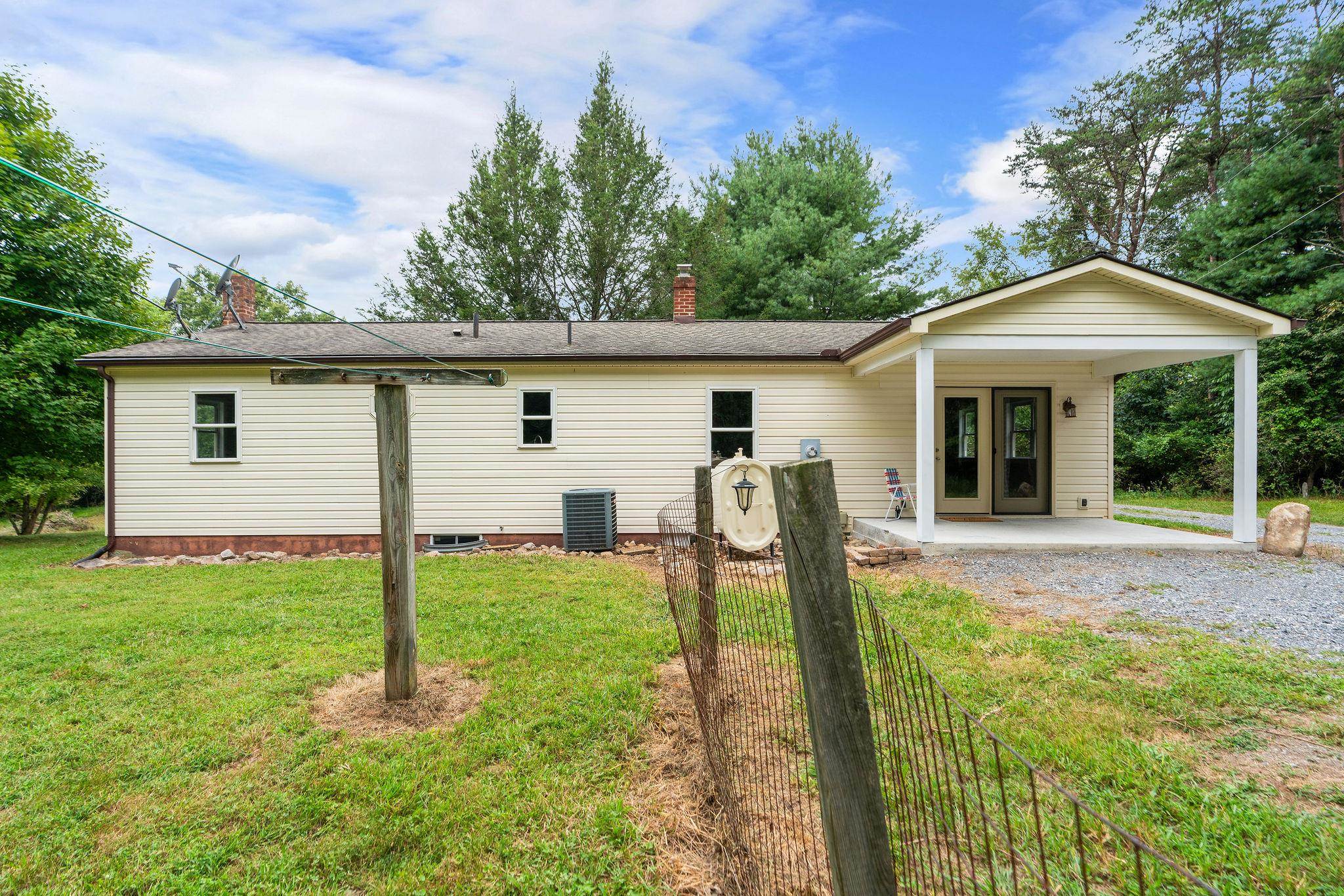 5264 Cold Springs Road Raphine, VA 24472 - Photo 43 of 57 a front view of house with a garden and patio