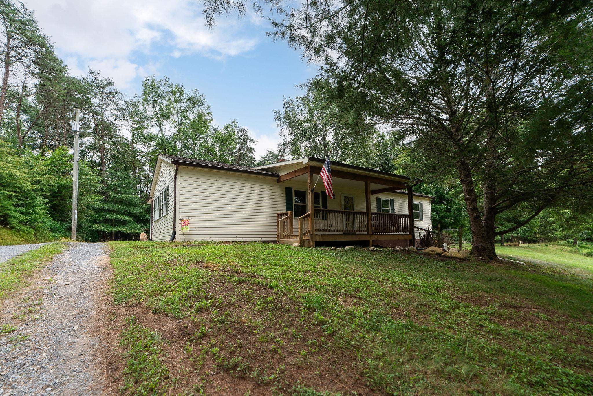 5264 Cold Springs Road Raphine, VA 24472 - Photo 48 of 57 a view of a house with a back yard