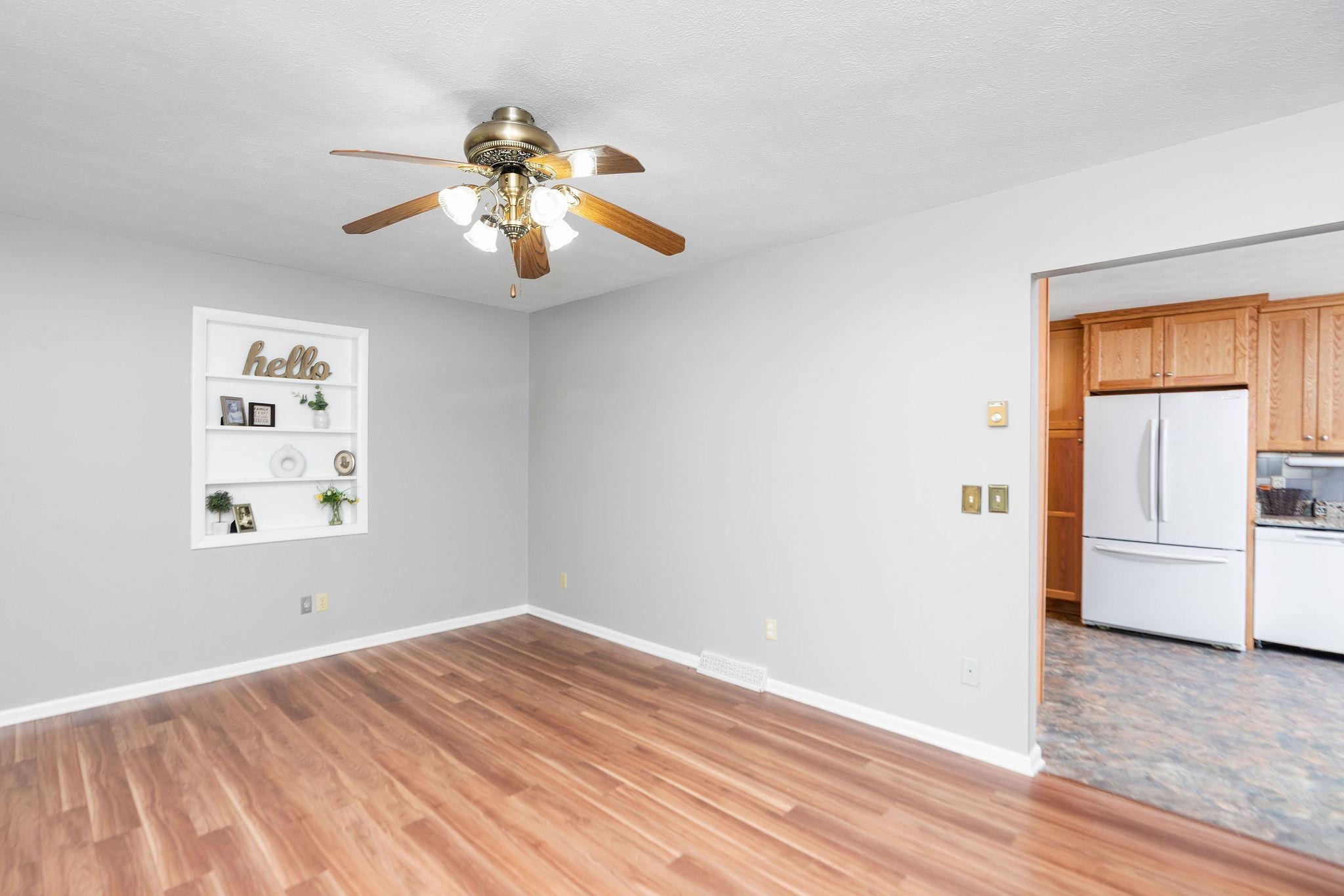 5264 Cold Springs Road Raphine, VA 24472 - Photo 7 of 57 a view of empty room with wooden floor and fan