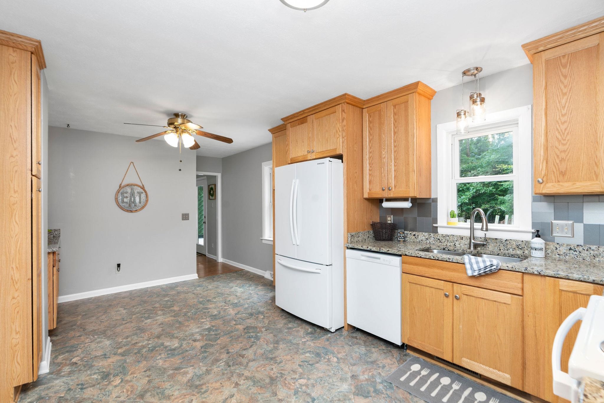 5264 Cold Springs Road Raphine, VA 24472 - Photo 10 of 57 a kitchen with a refrigerator and a sink