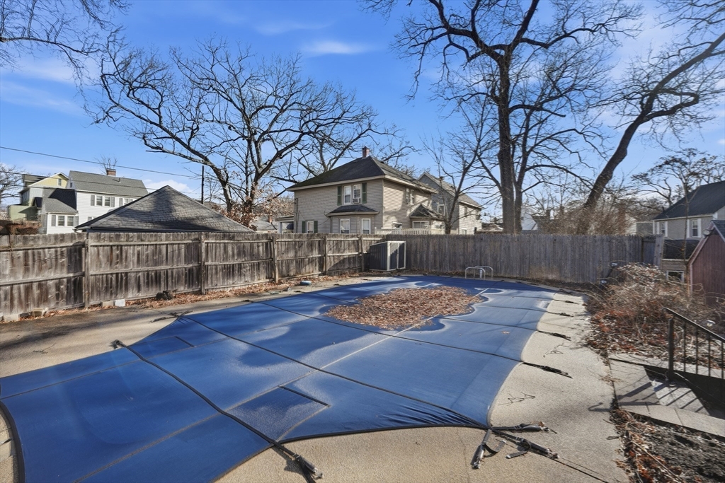 785 Dickinson Street Springfield, MA 01108 - Photo 27 of 36 a front view of house with yard and seating space