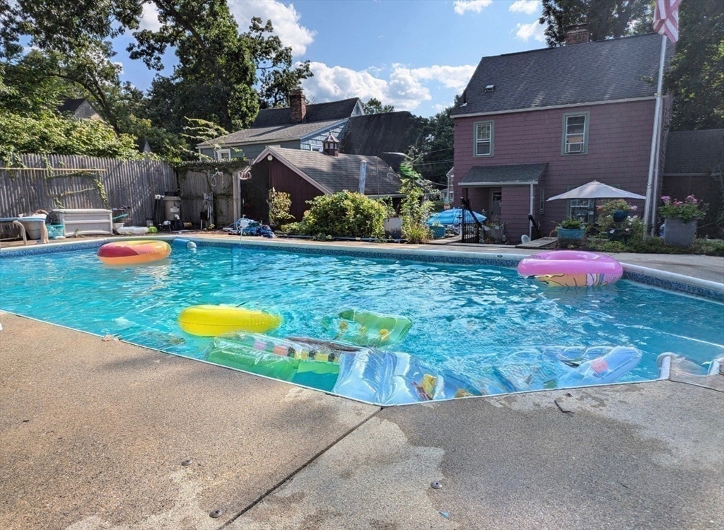 785 Dickinson Street Springfield, MA 01108 - Photo 29 of 36 a view of a backyard with plants and outdoor seating