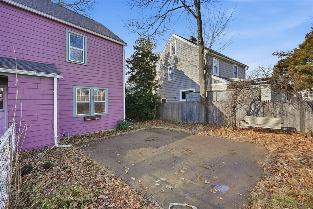 785 Dickinson Street Springfield, MA 01108 - Photo 5 of 36 a view of a house with a yard