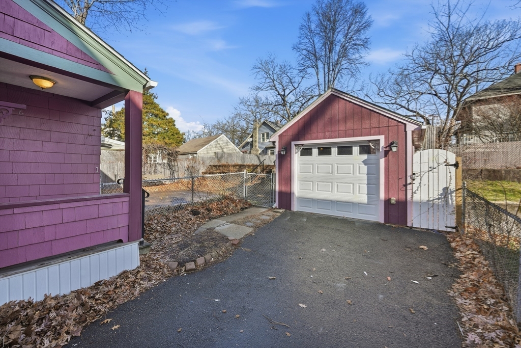785 Dickinson Street Springfield, MA 01108 - Photo 6 of 36 a front view of a house with a yard
