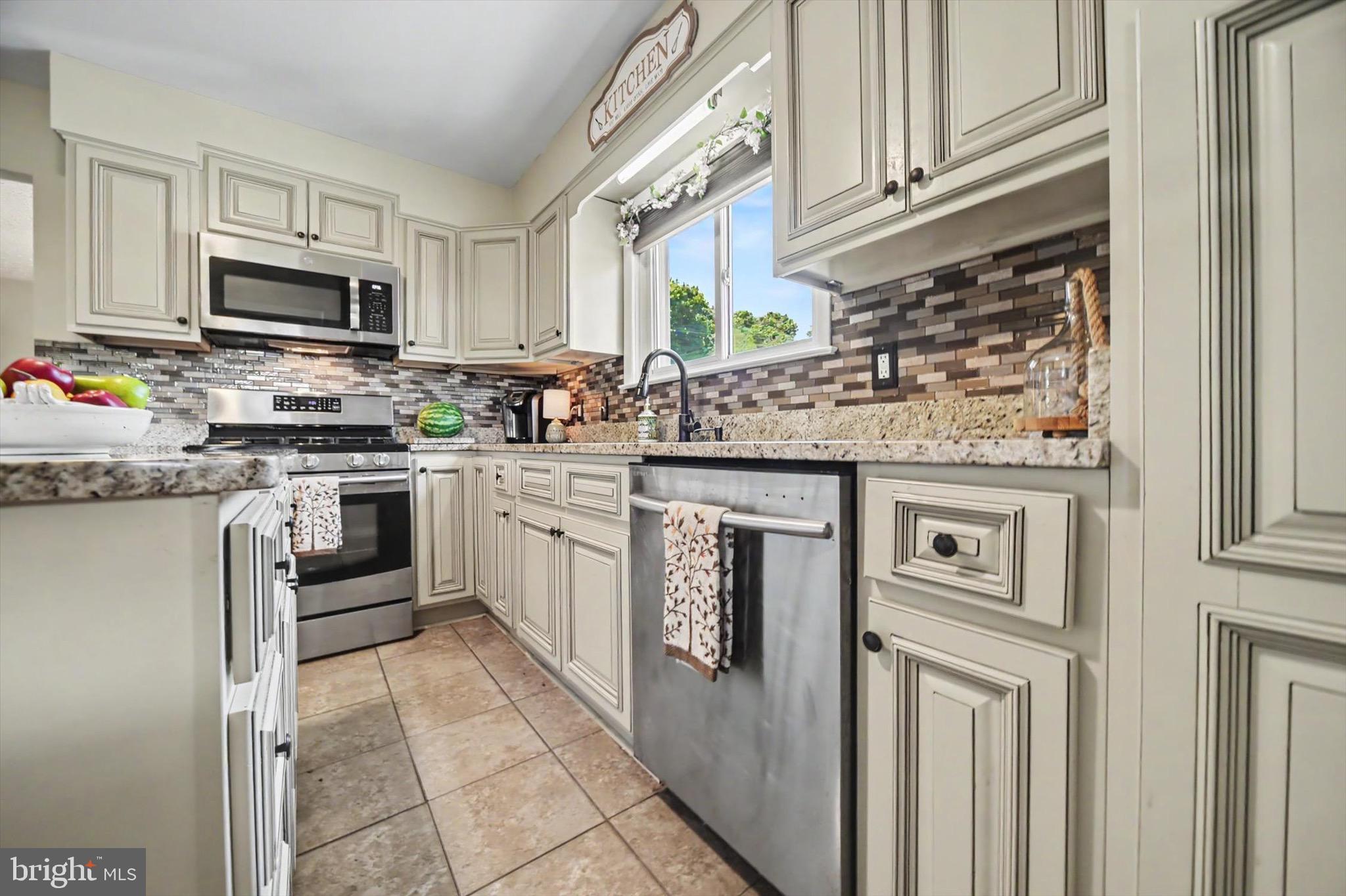 406 Plumtree Road Bel Air, MD 21015 - Photo 19 of 59 Stainless Steel Appliances, Mosaic Tile Backsplash