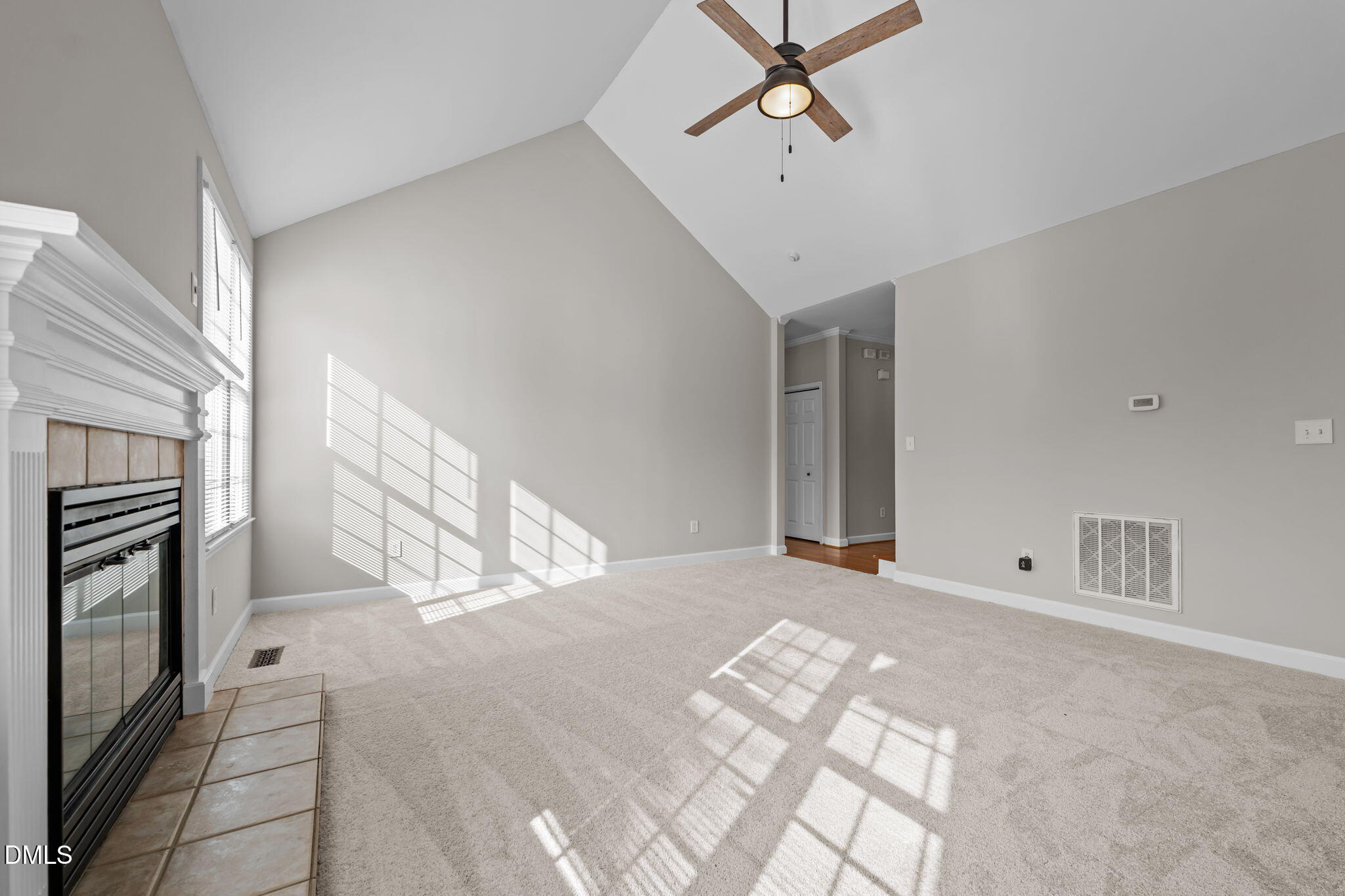 2327 Olde Spring Court Graham, NC 27253 - Photo 16 of 49 a view of a livingroom with a staircase