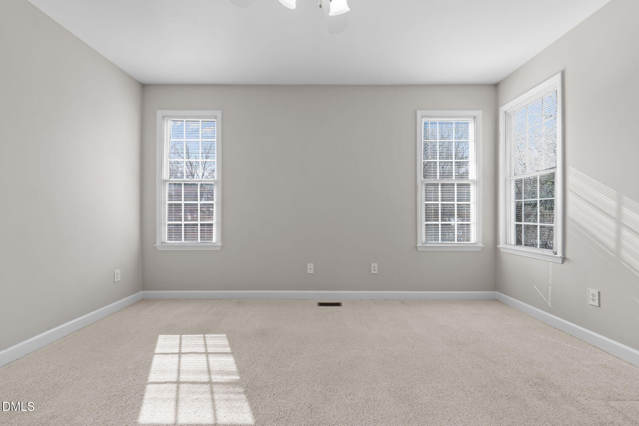 2327 Olde Spring Court Graham, NC 27253 - Photo 25 of 49 an empty room with windows