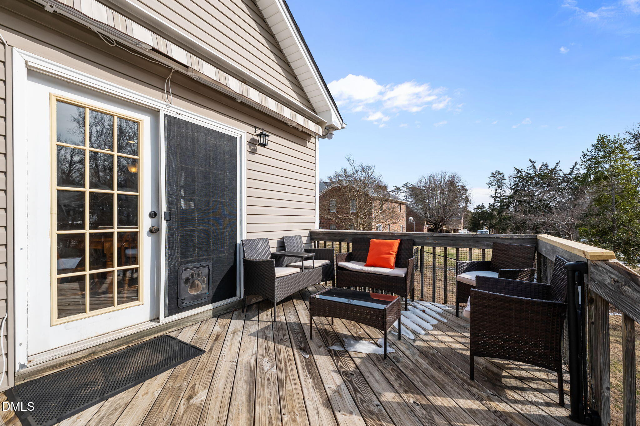 2327 Olde Spring Court Graham, NC 27253 - Photo 36 of 49 a roof deck with couches and wooden floor