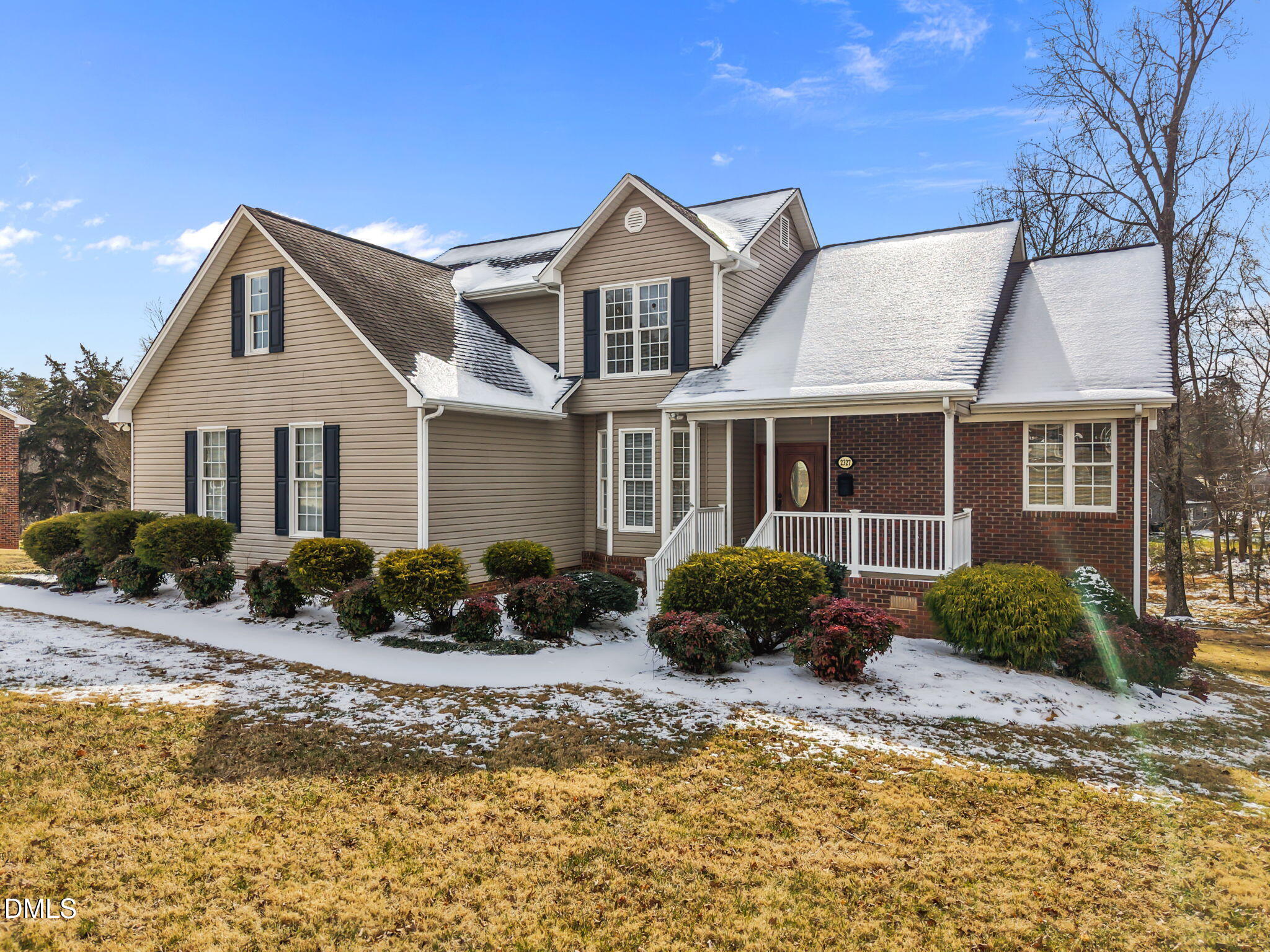 2327 Olde Spring Court Graham, NC 27253 - Photo 4 of 49 a front view of a house with yard and green space