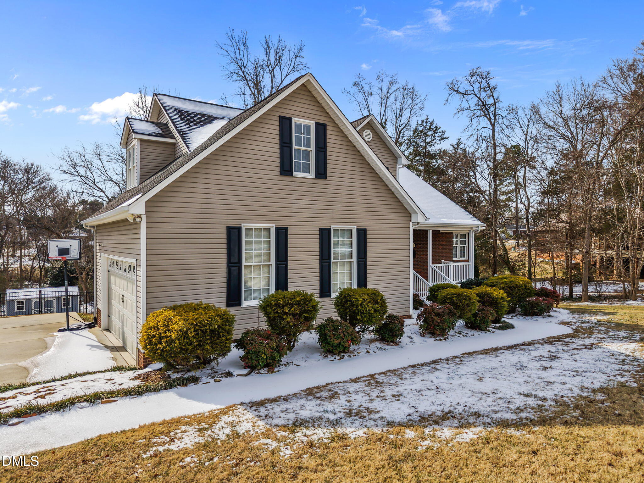 2327 Olde Spring Court Graham, NC 27253 - Photo 5 of 49 a view of a house with backyard and trees in the background