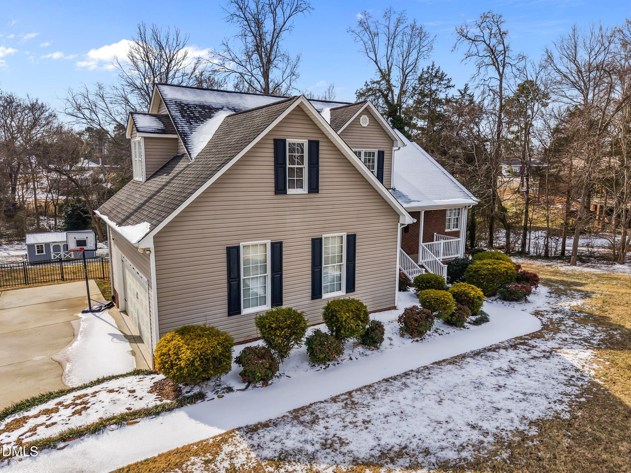 2327 Olde Spring Court Graham, NC 27253 - Photo 7 of 49 a front view of a house with garden