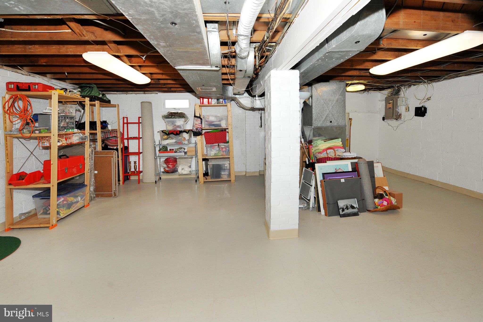 3310 Jones Bridge Road Chevy Chase, MD 20815 - Photo 17 of 21 Basement with high ceilings